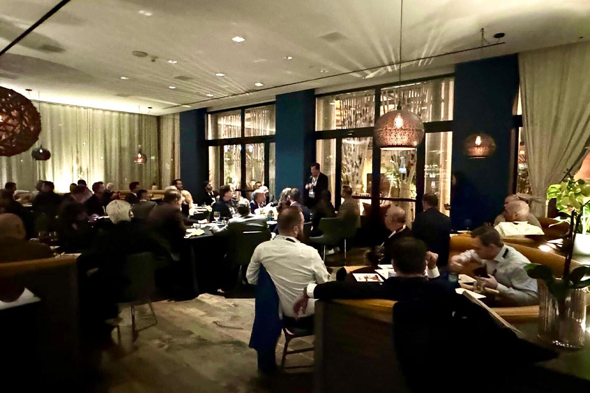 Members at a restaurant networking dinner