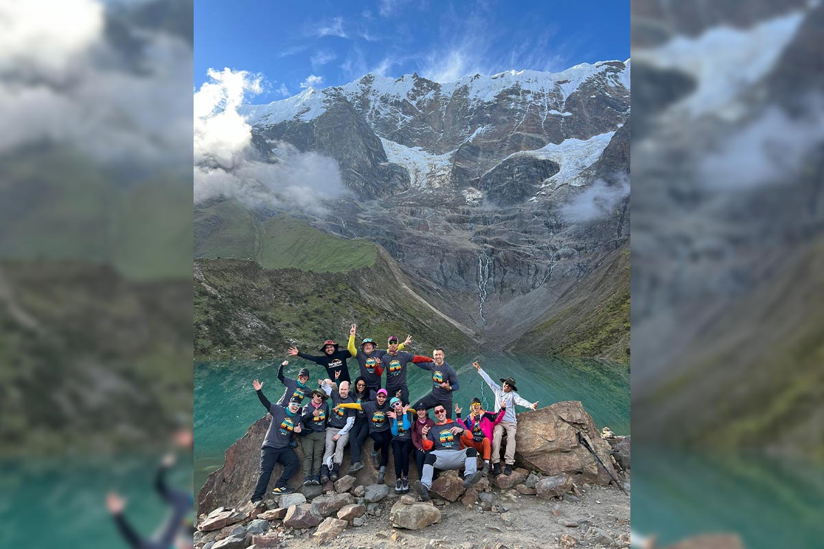 Members on a mountain lake trek